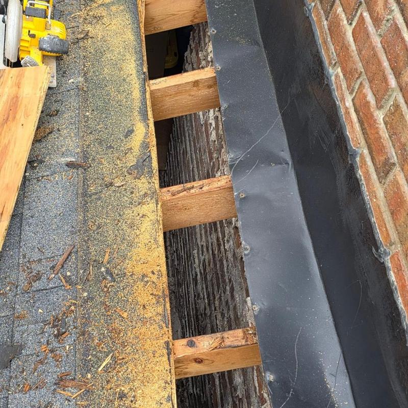 Chimney flashing and dry rot wood removal on roof Chimney flashing and dry rot wood removal on roof