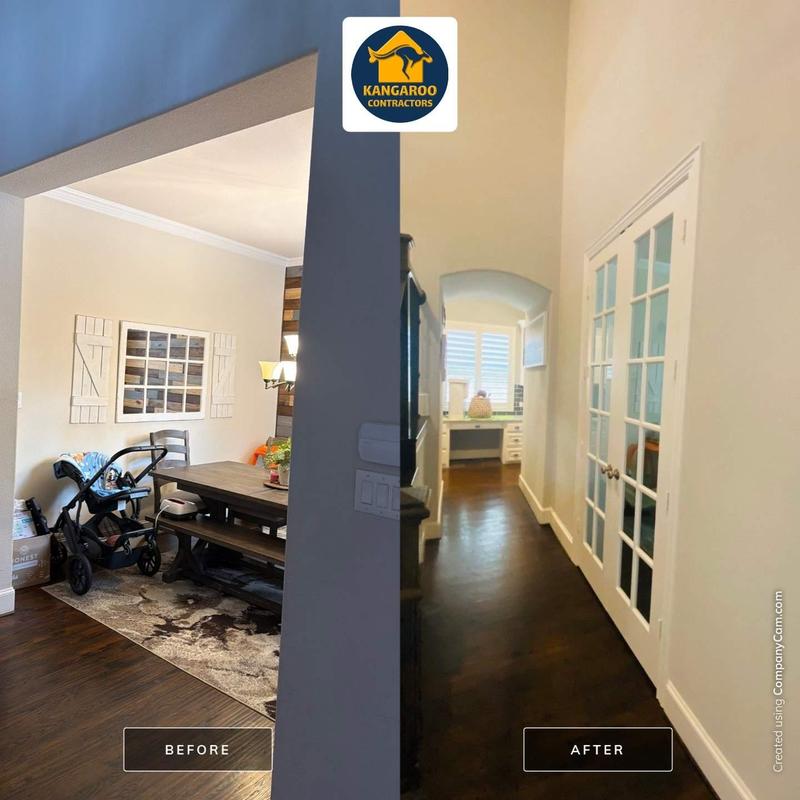 French doors installation with framed drywall and baseboards