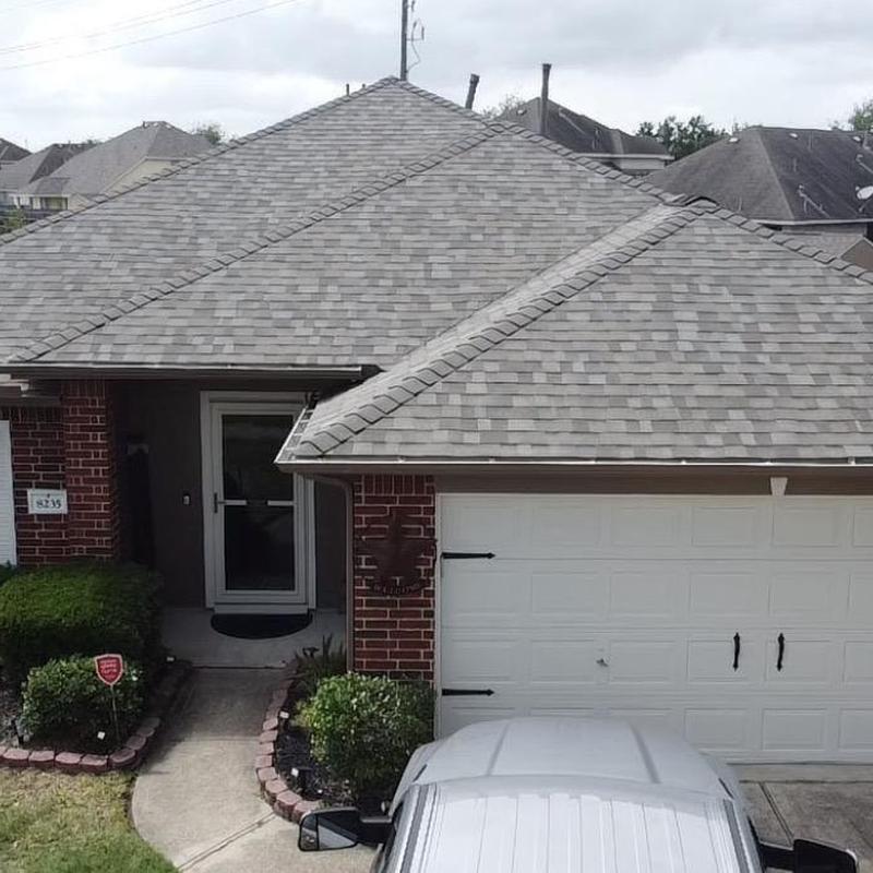 Owens Corning Driftwood roof on brick house
