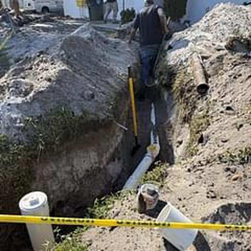 Sewer line installation with trench excavation Sewer line installation with trench excavation