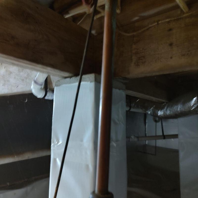 Single canister water filter installed in crawl space Single canister water filter installed in crawl space