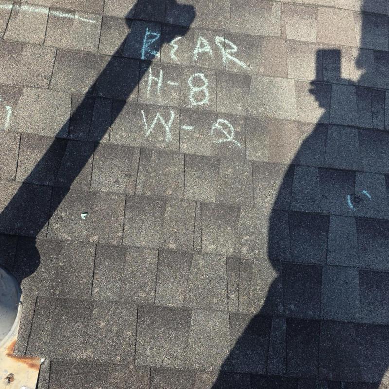 Asphalt shingle roof hail damage markings with shadows Asphalt shingle roof hail damage markings with shadows