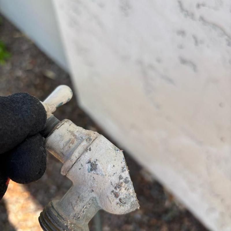 Exterior hose bib with corrosion damage close-up