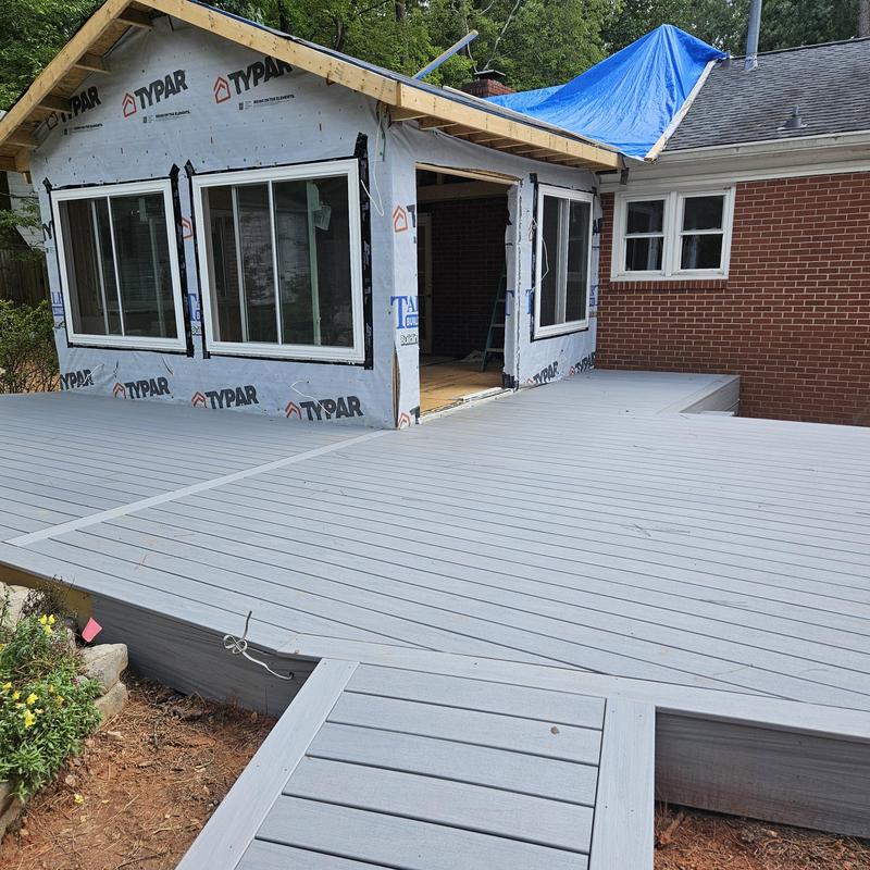 Sunroom framing and composite deck installation