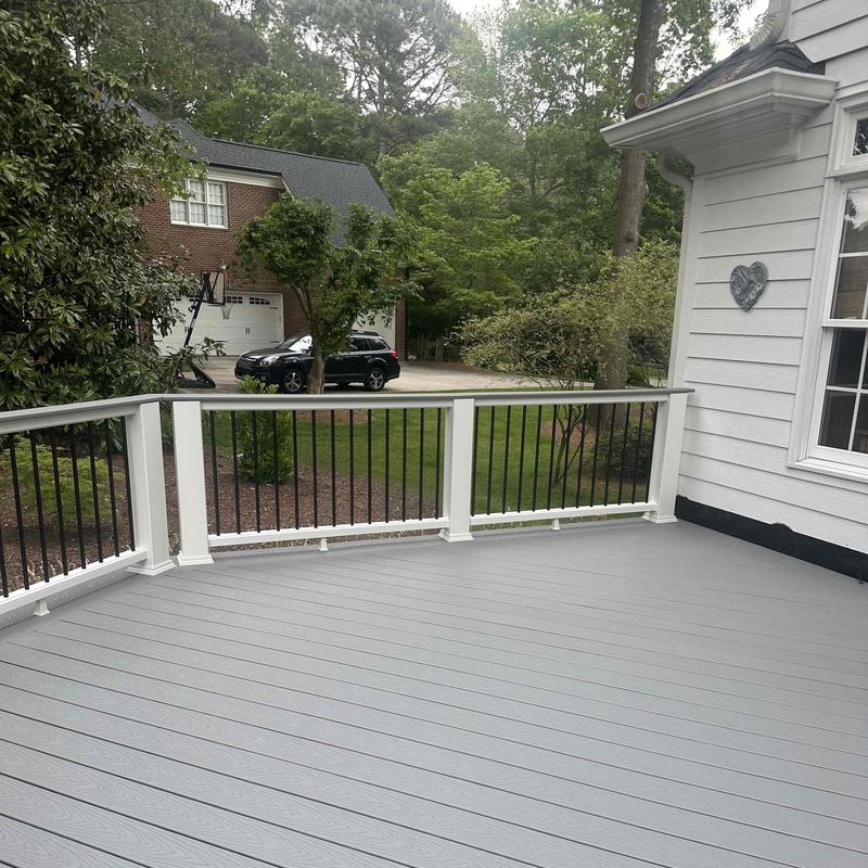 Composite deck with white posts and black balusters