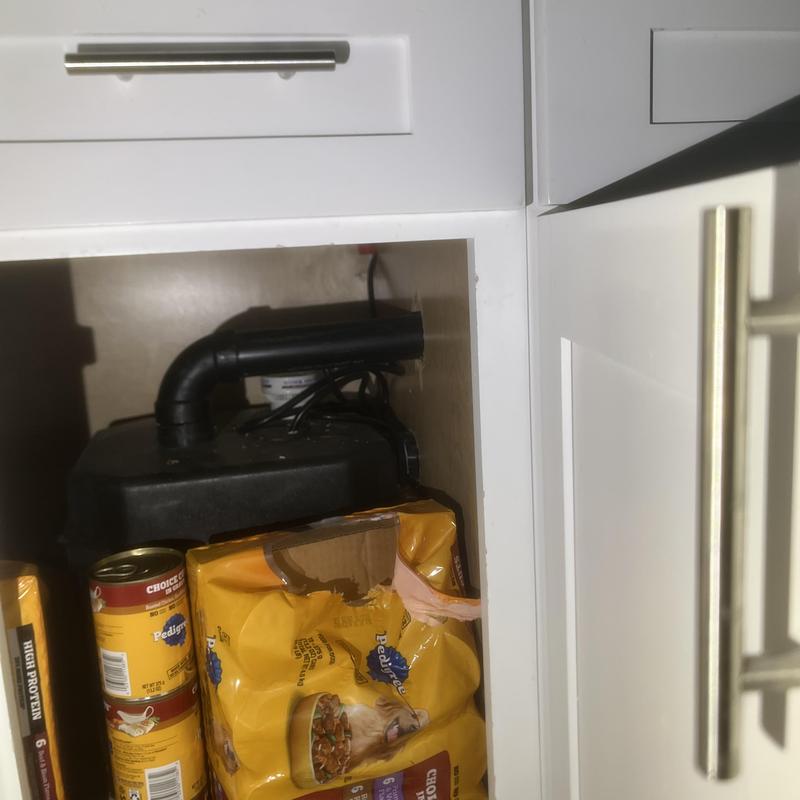 Ejector pump system under kitchen sink with pet food