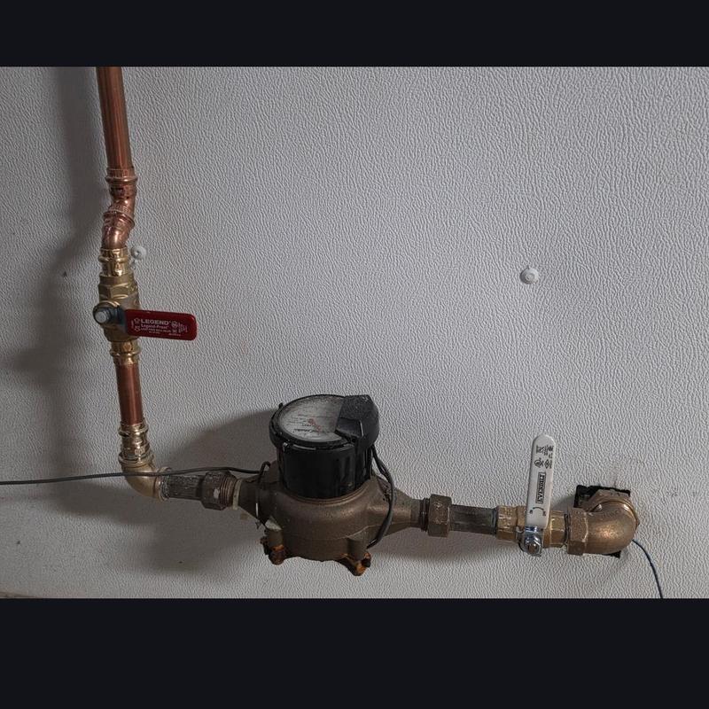 Water service line with ball valves and tracer wire installation