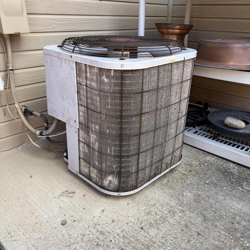 Condenser unit with bent fins needing comb out
