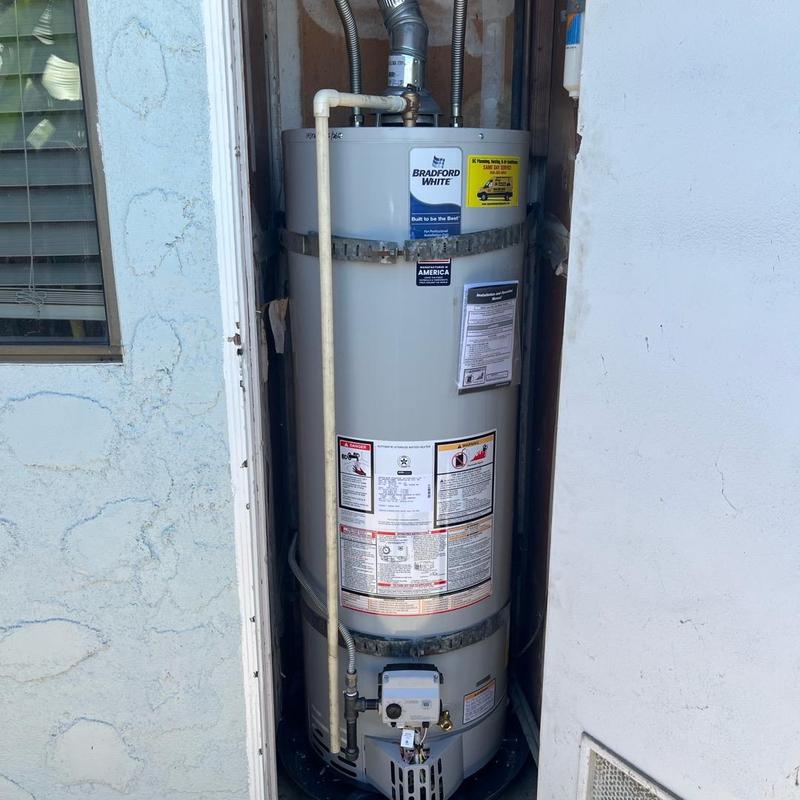 50 gallon water heater installed in outdoor closet