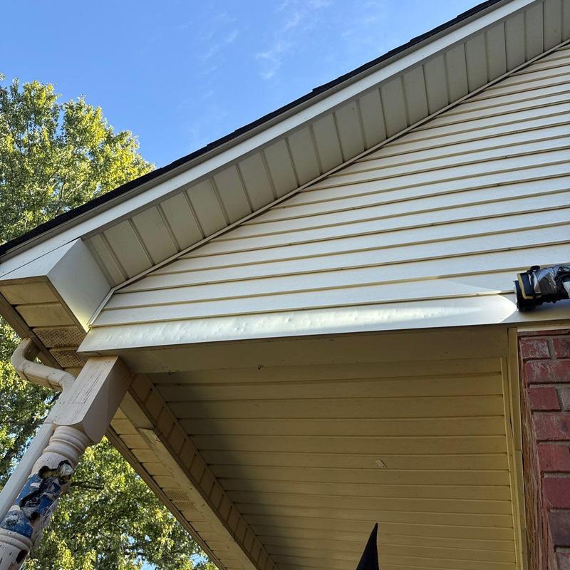 Soffit and fascia inspection on house exterior