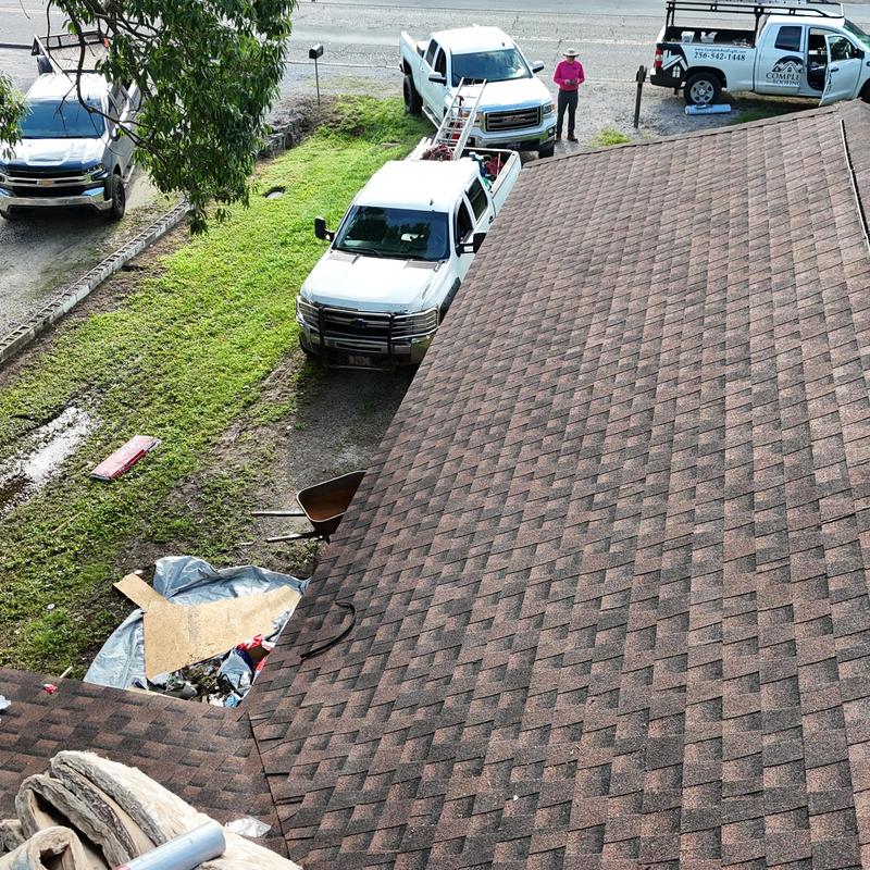 GAF HDZ asphalt shingle roof with trucks and equipment