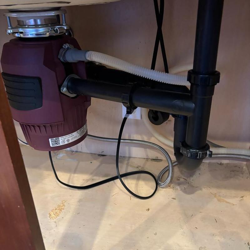 InSinkErator garbage disposal and kitchen sink drain assembly