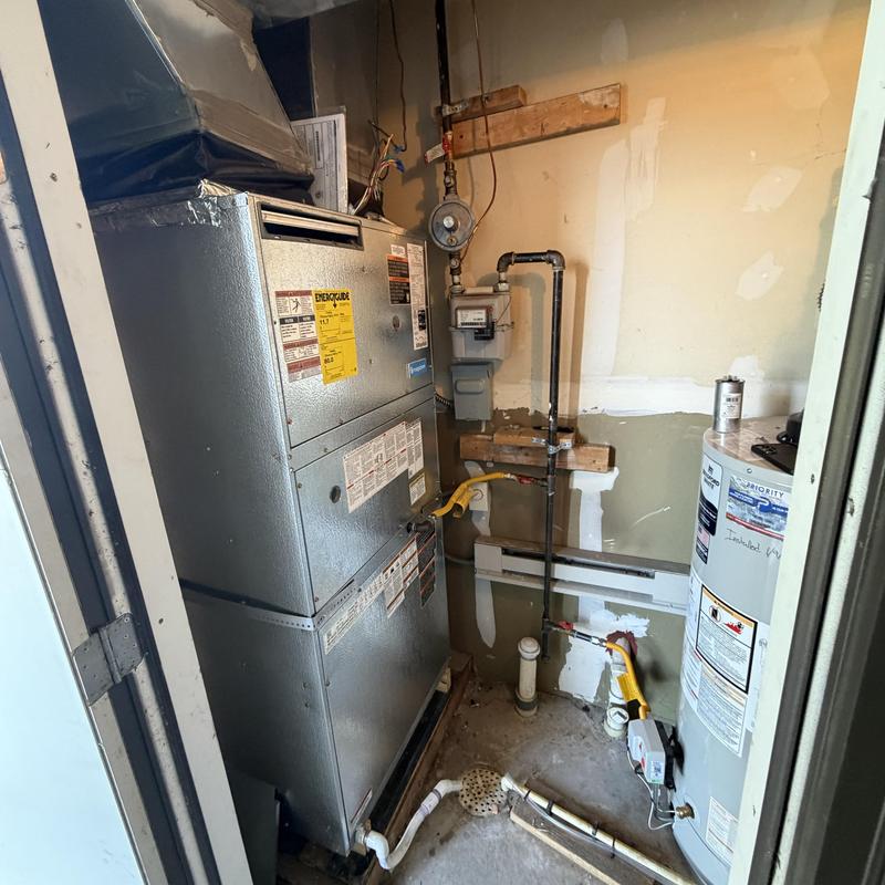 Magic Pack HVAC unit with water heater installation