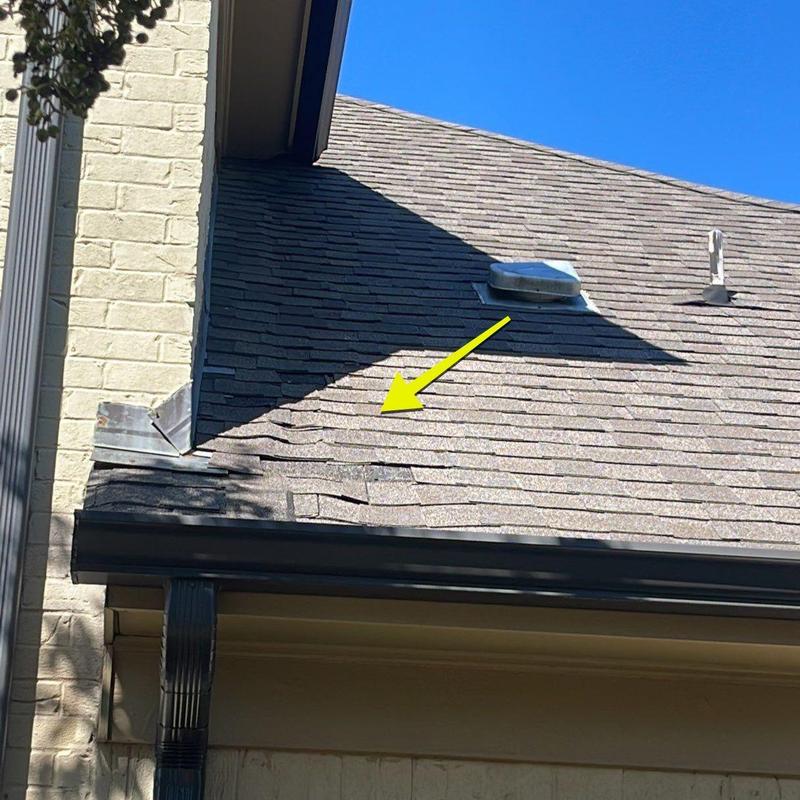 Certainteed Landmark asphalt shingles with damage