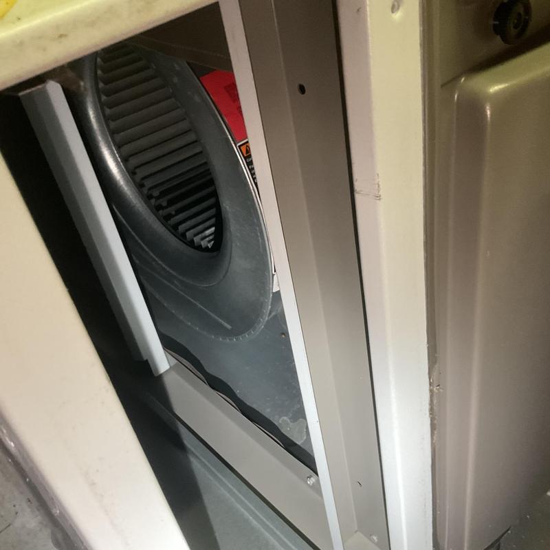 Furnace blower wheel inside HVAC unit close-up