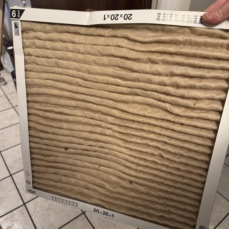 Air conditioner filter clogged and removed for thawing