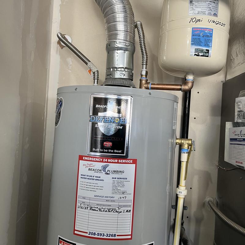 Water heater with new expansion tank and valve replacements