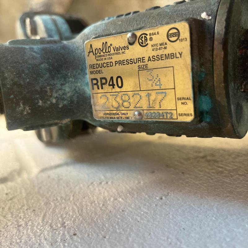 Reduced pressure backflow assembly label close-up Reduced pressure backflow assembly label close-up