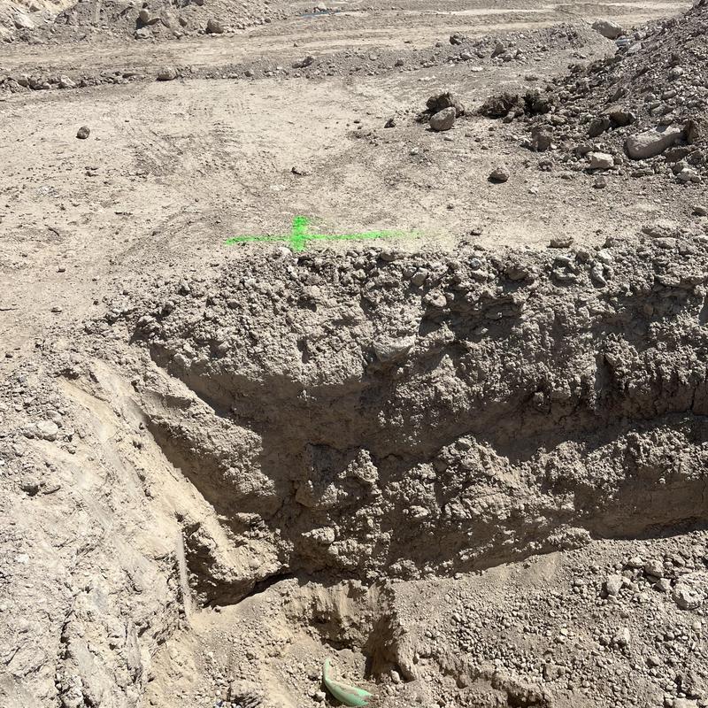 8-inch sewer main excavation site with soil markings 8-inch sewer main excavation site with soil markings