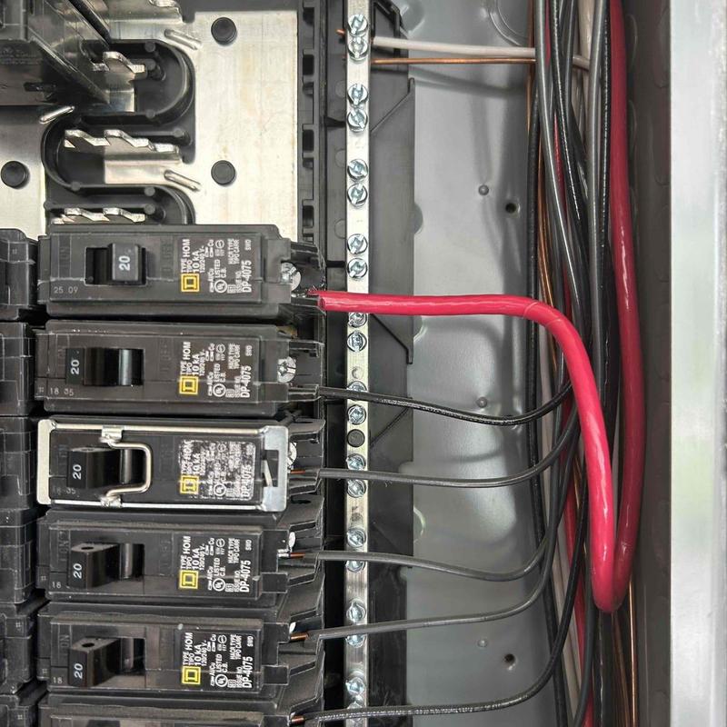 Electrical panel with new 20 amp breaker and wiring Electrical panel with new 20 amp breaker and wiring