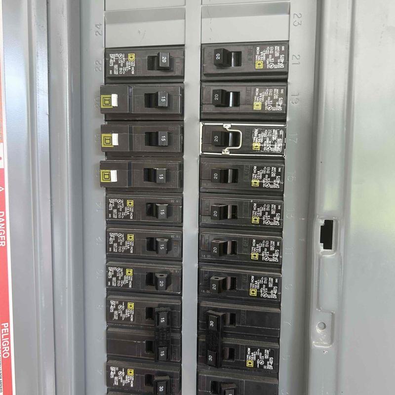 Electrical panel with new 20 amp breakers installed Electrical panel with new 20 amp breakers installed