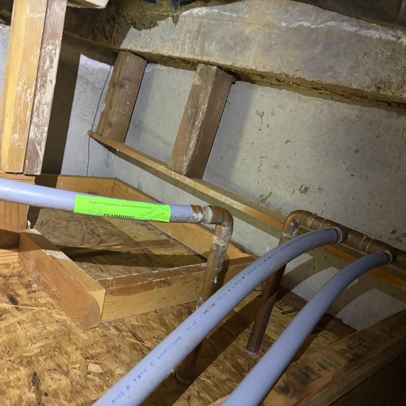 Kitchen sink drain pipes with copper fittings and PEX tubing