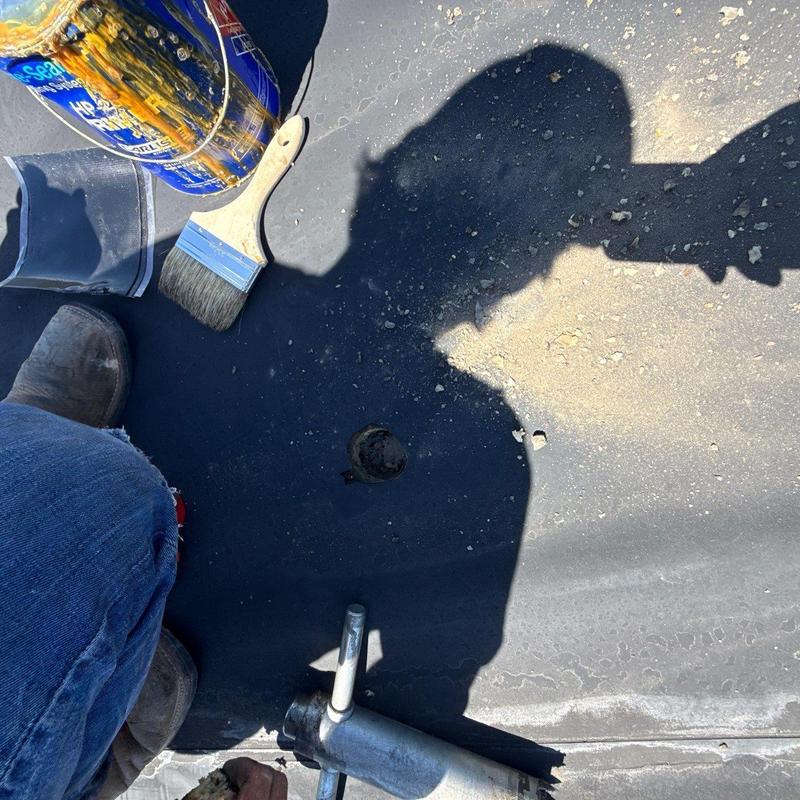 EPDM membrane roof drain inspection with sealant tools