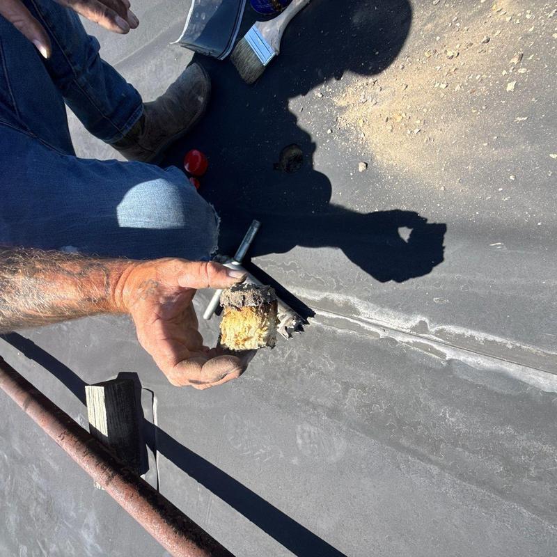 EPDM roof core sample showing insulation damage