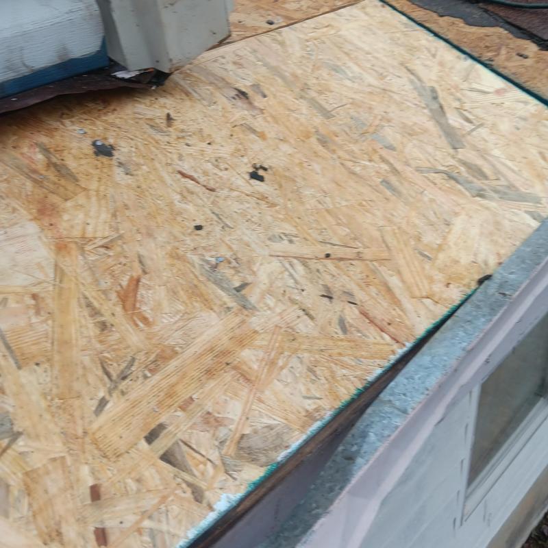 OSB roof decking replacement on residential flat roof edge