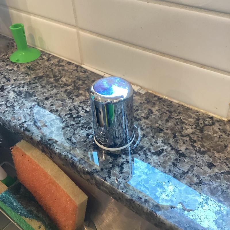 Dishwasher air gap installed on granite countertop