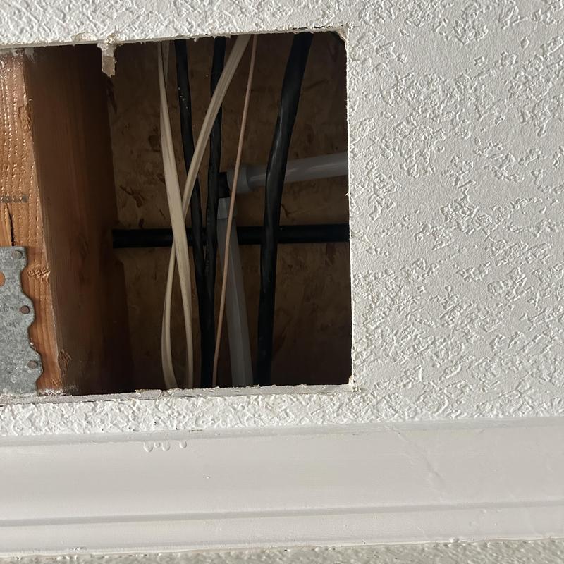 Copper water lines with PEX-a pipe near wall cutout