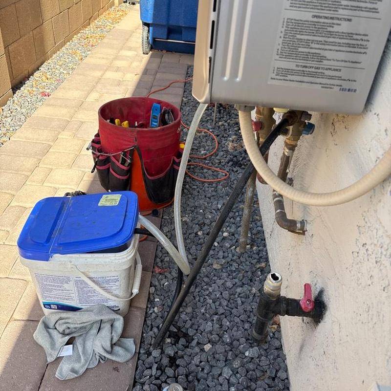 Tankless water heater flushing with Calci-free solution