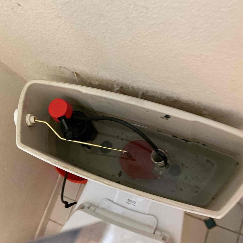 Toilet fill valve and flapper installation inside tank