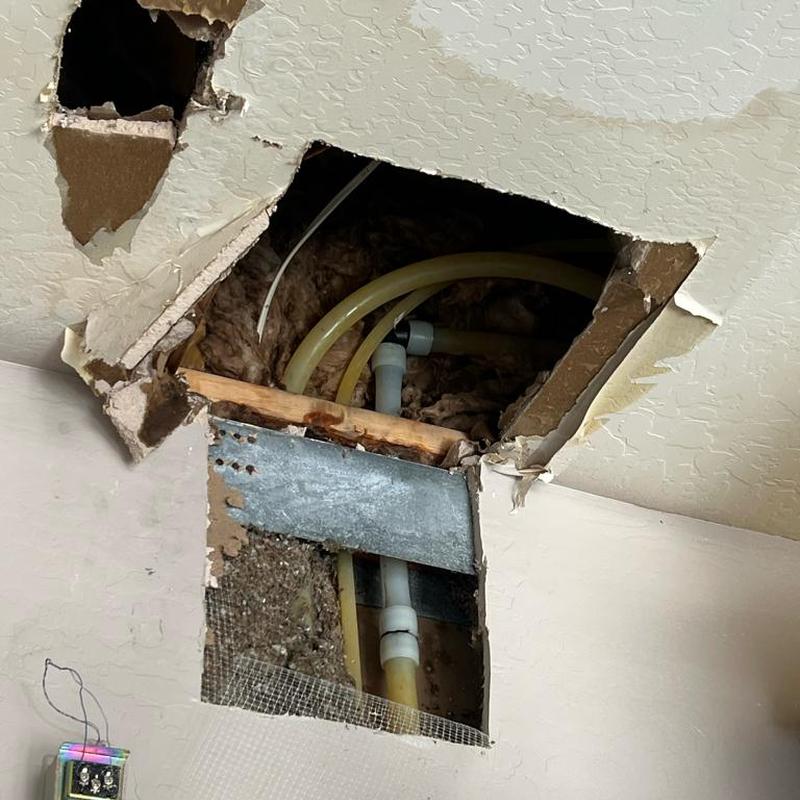 1-inch PEX pipe water line leak repair in ceiling cutout