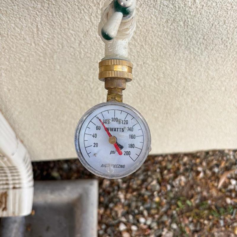 Water pressure gauge on outdoor hose bib in Queen Creek