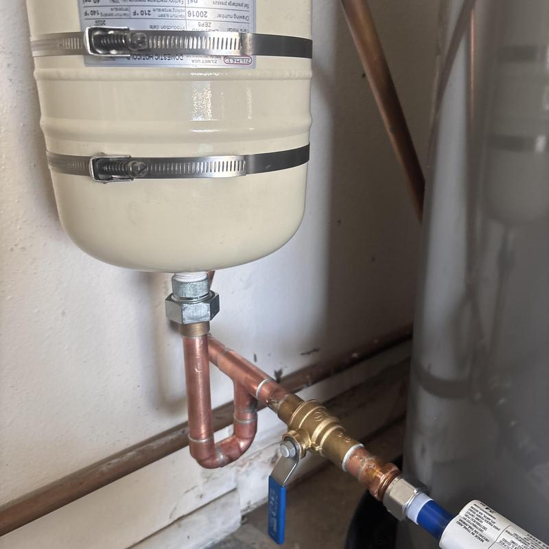 Thermal expansion tank with copper and brass plumbing valves Thermal expansion tank with copper and brass plumbing valves