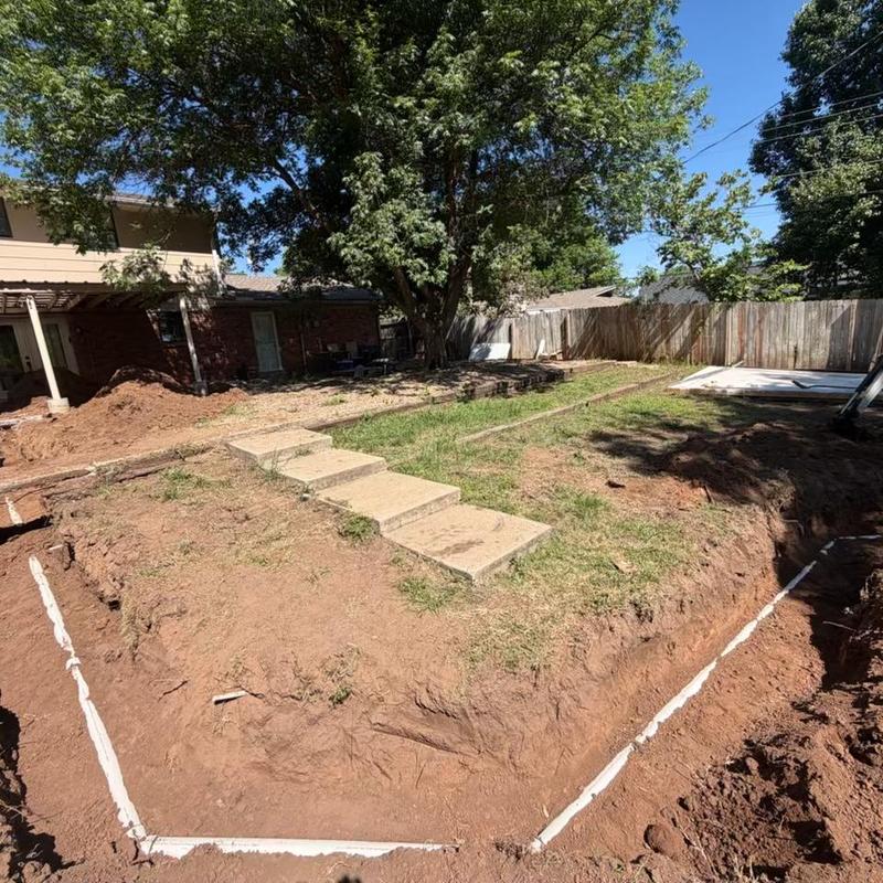 Sewer service line trench excavation in backyard Sewer service line trench excavation in backyard