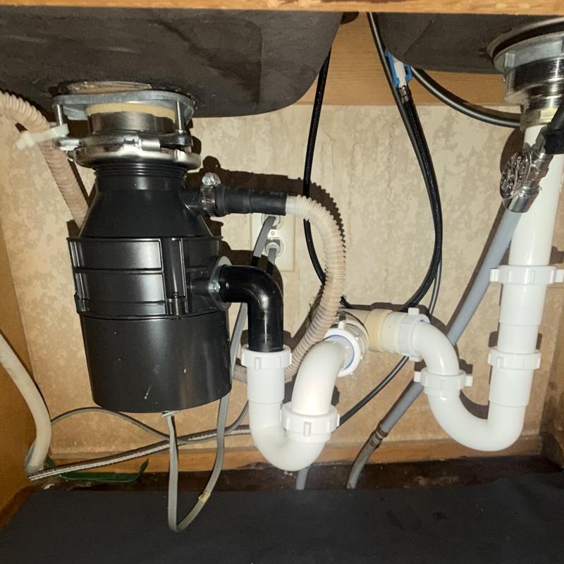 Kitchen sink garbage disposal and drain piping installation