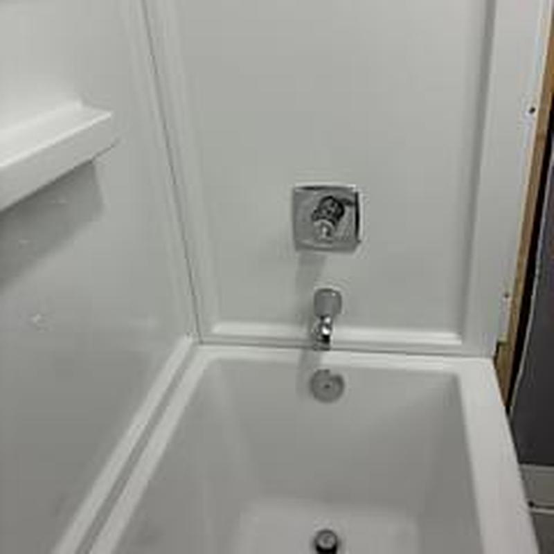 Bath tub and surround with new valve and fittings