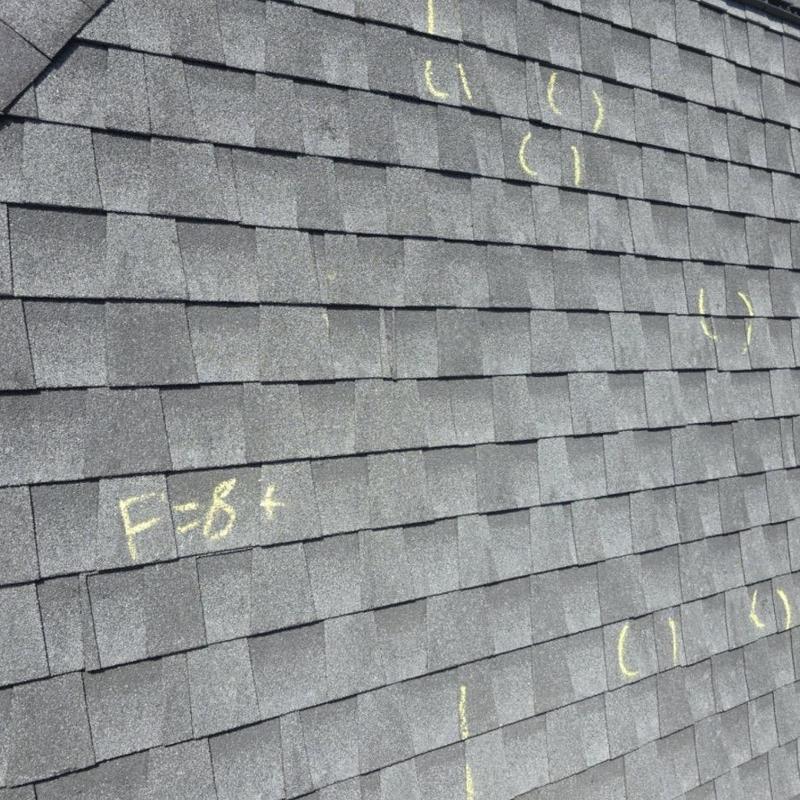 Asphalt shingle roof hail damage markings