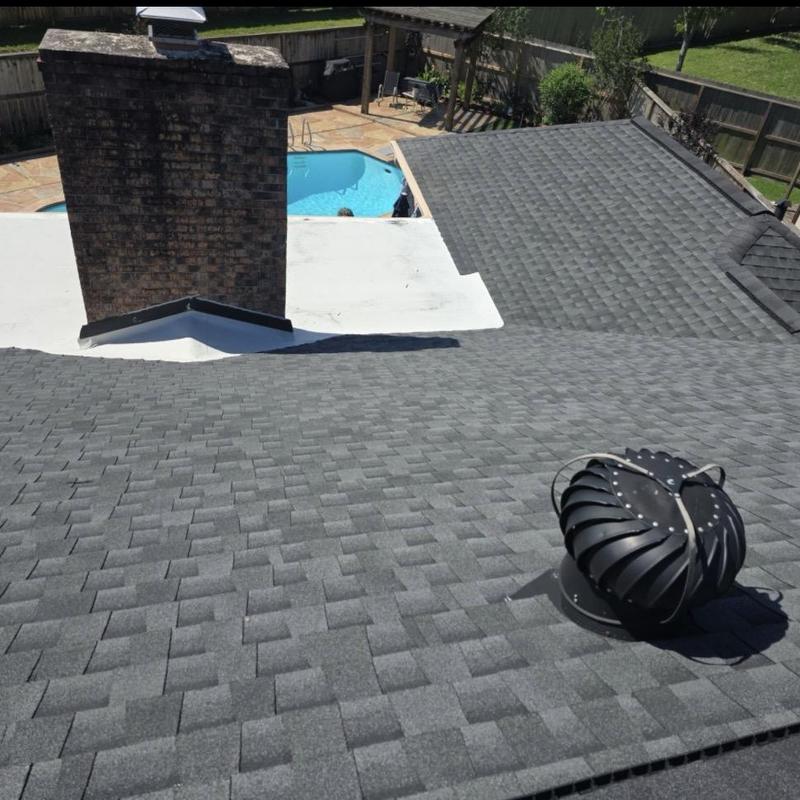Asphalt shingle roof with chimney and turbine vent