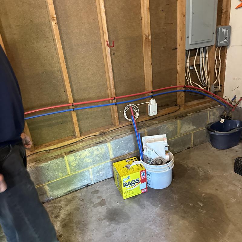 Water supply pipes installed inside wall studs