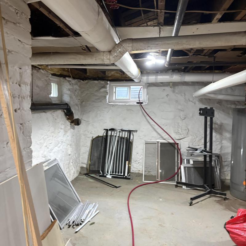 Basement drain pipe hydro-jet cleaning in progress Basement drain pipe hydro-jet cleaning in progress