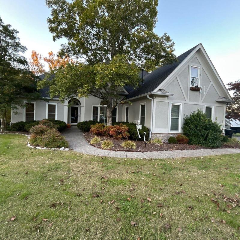 Asphalt shingle roof with hail damage inspection