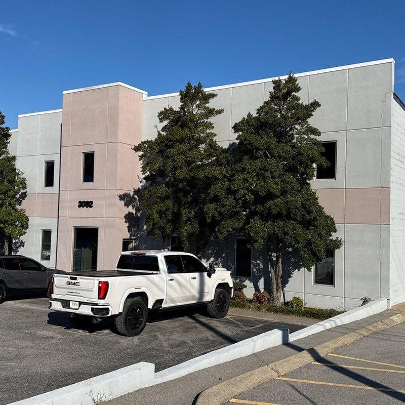 Commercial roof hail damage with flashing and drainage issues