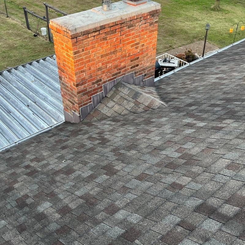 Asphalt shingles and chimney flashing inspection