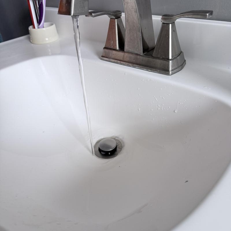 Lavatory sink drain with flowing water and faucet Lavatory sink drain with flowing water and faucet