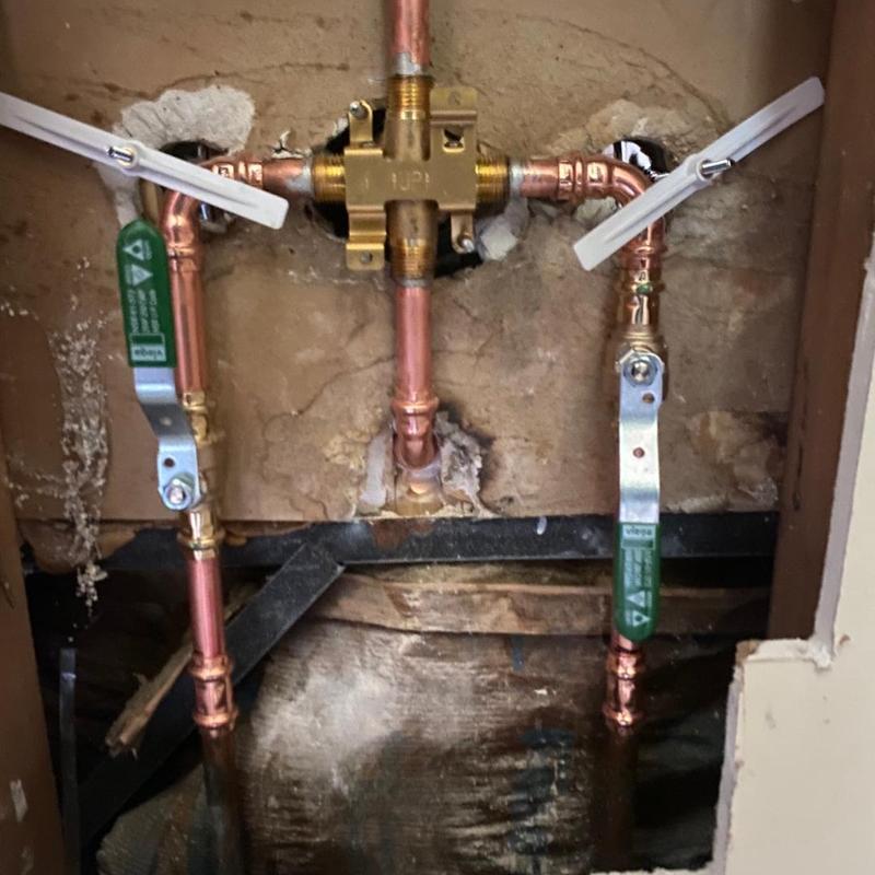Shower valve assembly with copper piping installation