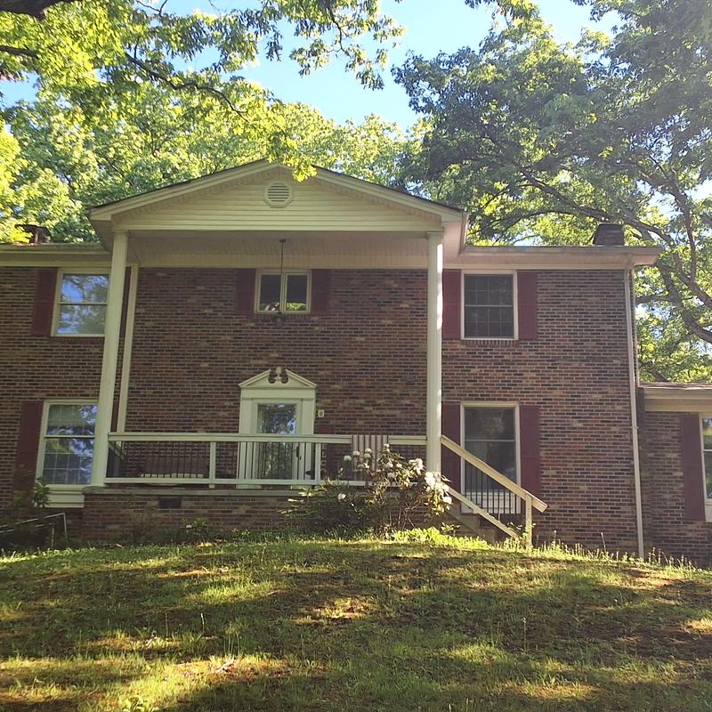 3-tab shingle roof inspection on brick home exterior 3-tab shingle roof inspection on brick home exterior