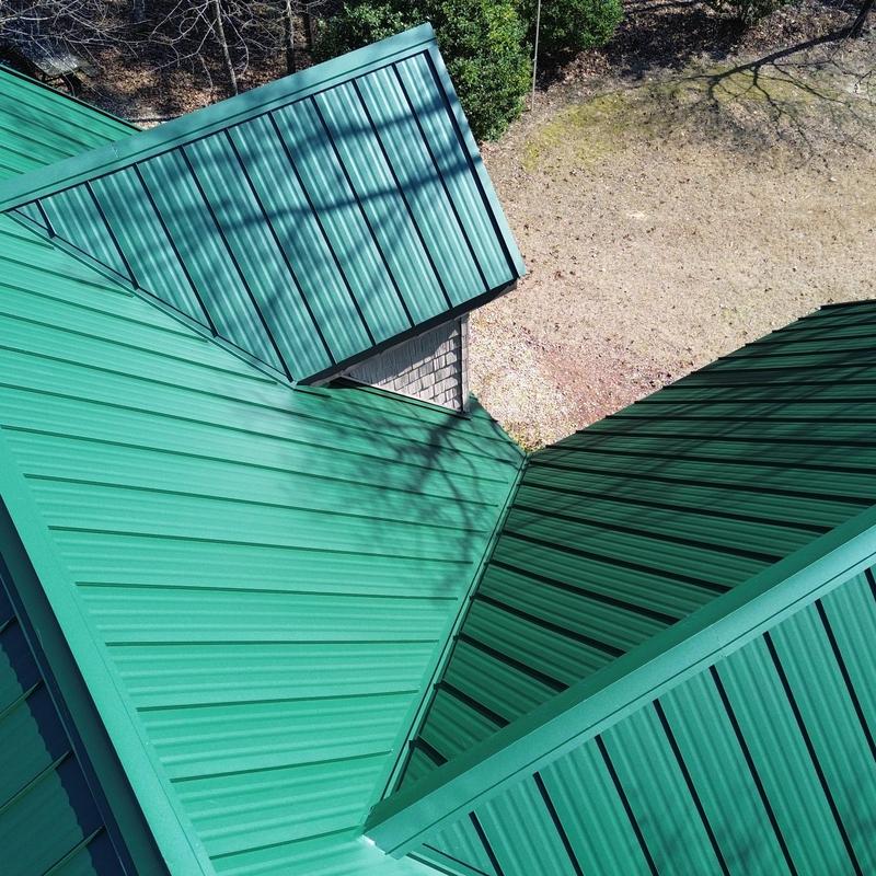 Green metal roofing system with complex valleys